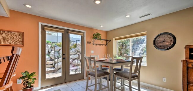 Dining area w/waterfall outside - 662 E Old English Rd