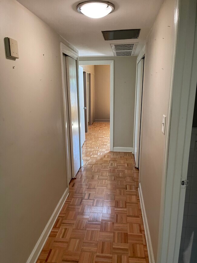 Hallway to Besromms - 1300 Queens Rd