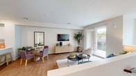 Located at 29986 Berea Road in Menifee, CA, this three-story, 2-bedroom, 2-bathroom home offers a well-organized layout distributed across multiple levels. The ground floor provides a welcoming entrance, while the main living level serves as the heart of the home, featuring an open-concept design that seamlessly integrates the living room, dining area, and kitchen. The kitchen is outfitted with white shaker cabinetry, quartz countertops, stainless steel appliances including a French door refrigerator and electric range, a large center island with a double-basin sink, and a subway tile backsplash. The living area opens through sliding glass doors to a private balcony with views of the surrounding Menifee community. The upper floor houses both bedrooms, each with closets and wood-look flooring. The primary bedroom offers a comfortable, well-lit retreat, while the second bedroom features large windows that allow ample natural light. Both bathrooms are finished with clean, modern fixtures, including a tiled tub-shower combination. Additional highlights include multiple closets for storage, a dedicated laundry area, a utility room, and staircase connections between all three levels. Warm-toned flooring and a neutral color palette carry throughout the home, creating a cohesive and inviting atmosphere.