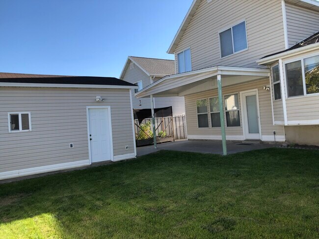 Full backyard showing home - 5542 S 4175 W