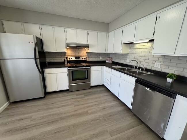 Building Photo - Home Sweet Home — 3 Bedroom with 2-Car Garage