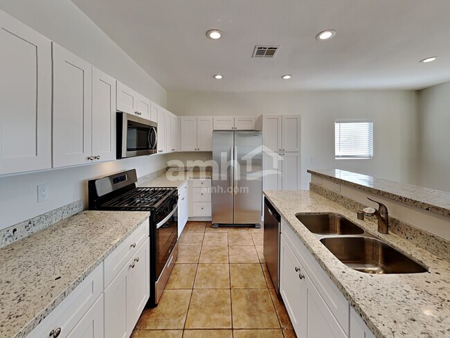 Building Photo - 1613 White Daisy Way