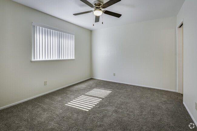 3BR, 2BA - 1150SF - First Bedroom - Summer Village Apartments