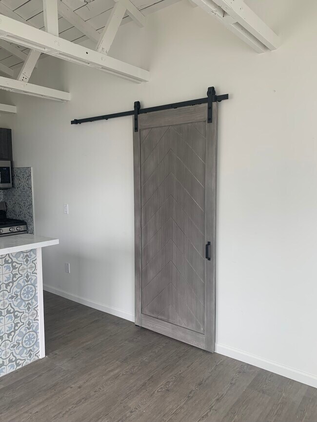 Barn Door to Bedrooms - 120 2nd St