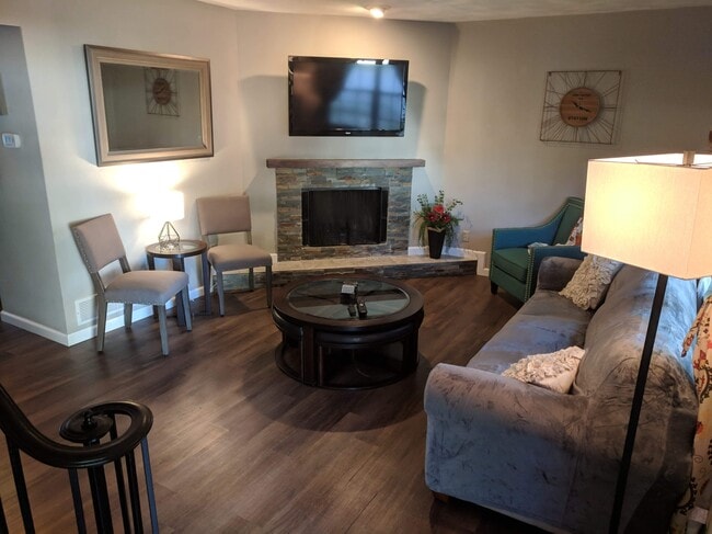 Living Room with Wood Burning Fireplace - 833 Nowland Ct