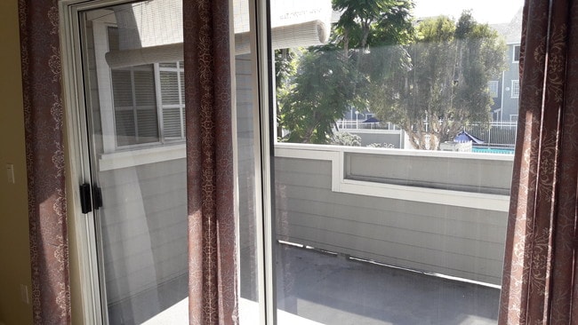 large balcony overlooking pool - 3500 S Greenville St