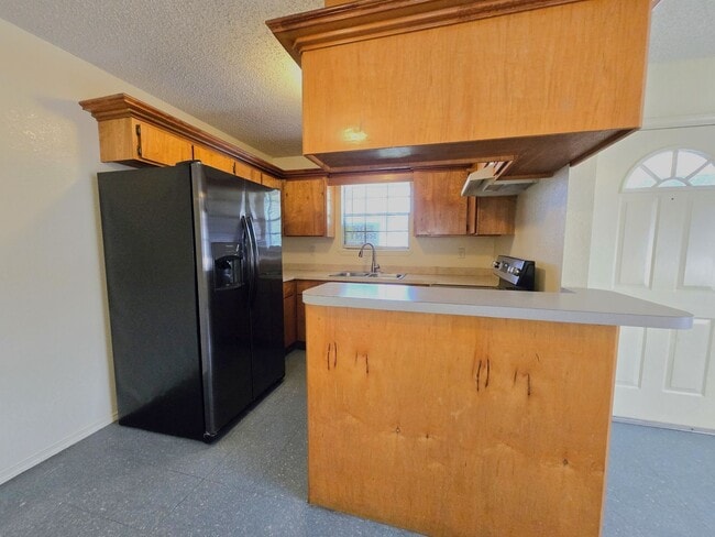 Building Photo - Quaint 2BD/1BTH apartment with a big back yard!