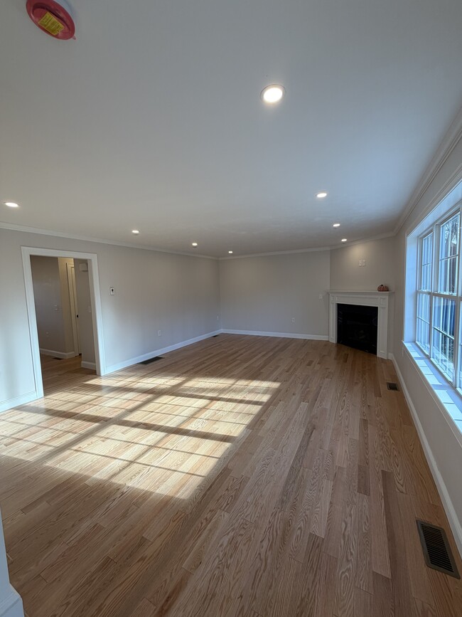 Living room with gas fireplace - 507 Mendon Rd