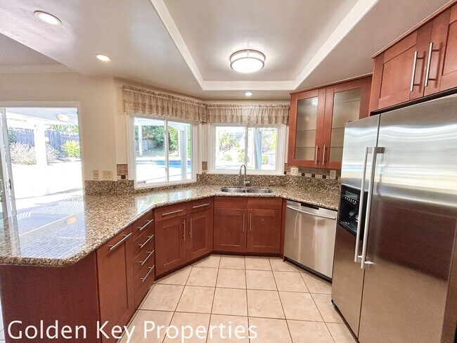 Building Photo - Welcome to this stunning 4-bedroom, 2.5-ba...