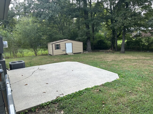 Patio and shed in fenced back yard - 2767 Sunrise Dr