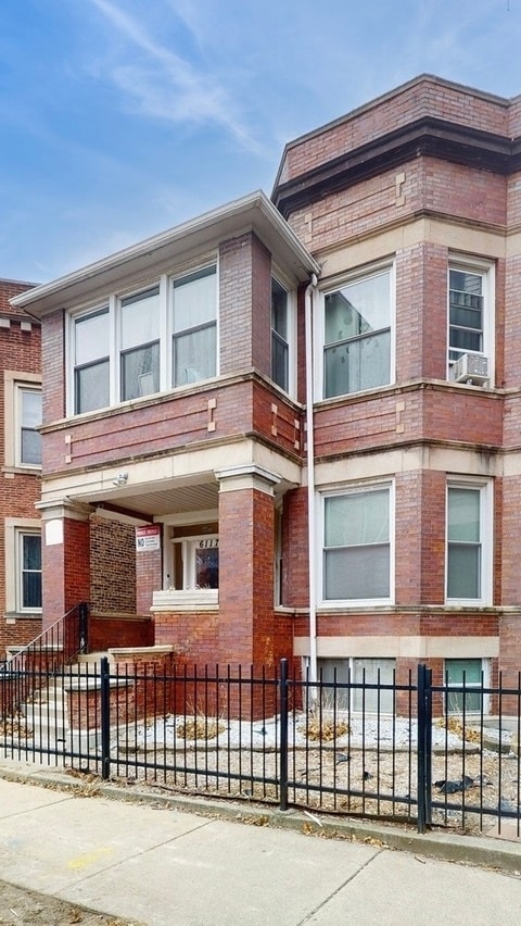 Building Photo - 6117 S Vernon Ave