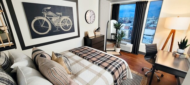 Bedroom comes with queen size bed and dresser drawers - Avery Philly Apartments