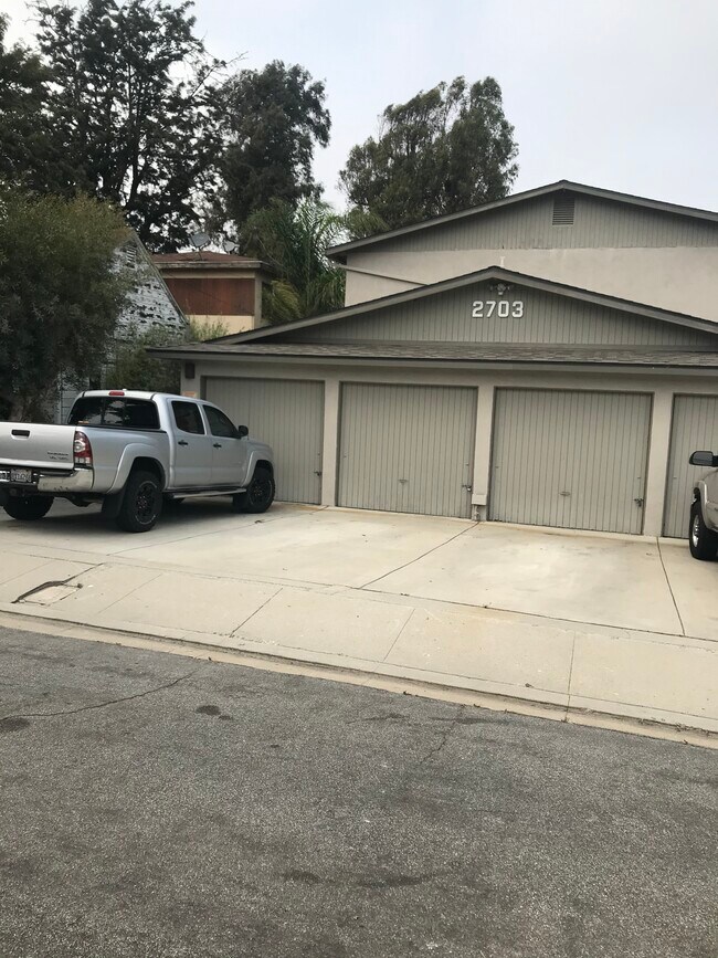 1 car garage and one space - 2703 Nelson Ave