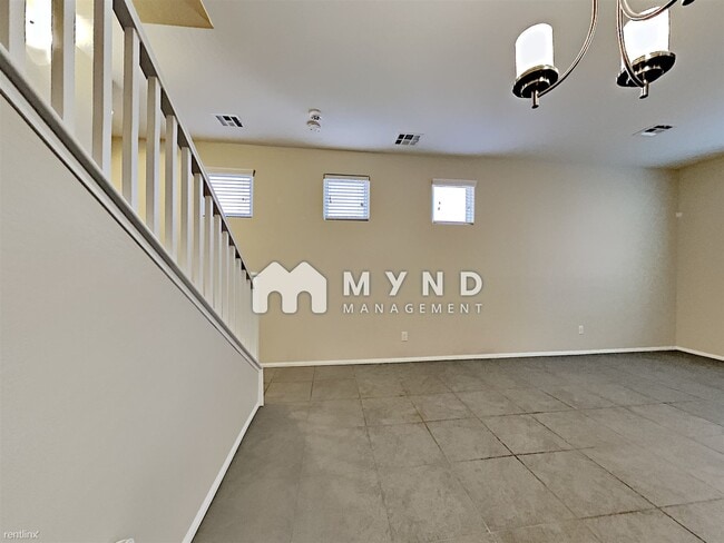 Building Photo - 9345 Pink Stargazer Ave