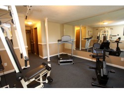 Fitness Center w/TV - Evergreen Pointe