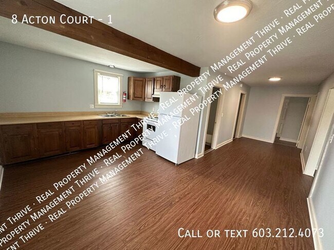 Building Photo - Updated First Floor 2 BR - First Month's R...