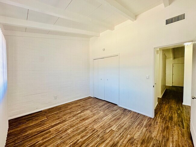 Building Photo - Spacious 2 Bedroom with New Flooring/Paint...