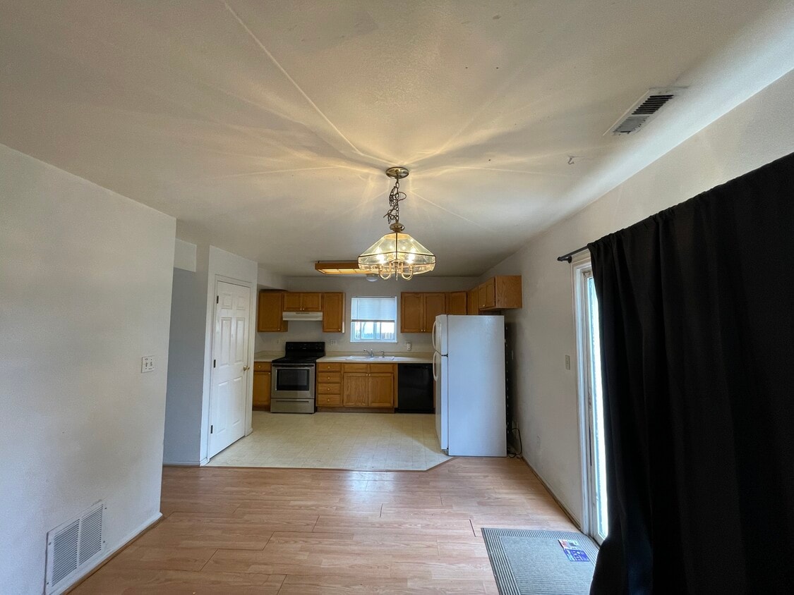 Dining area and kitchen - 780 Century Ln