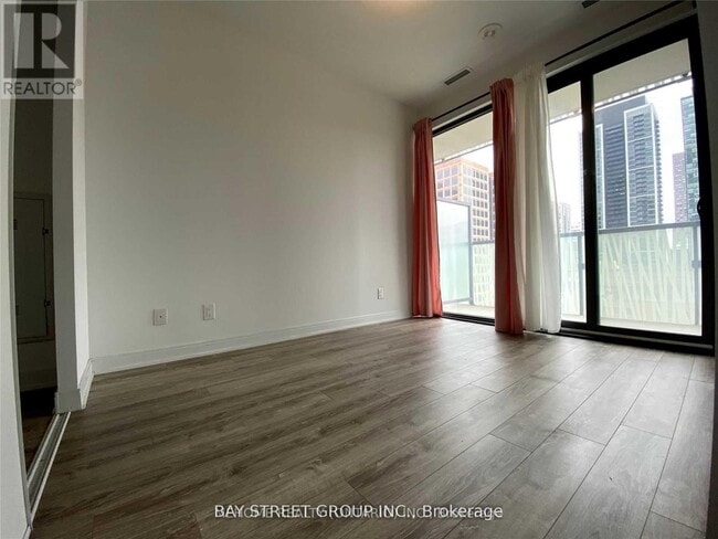 Building Photo - 50 Charles St E