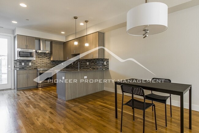 Building Photo - Georgeous Modern Condo with a Kitchen Fit ...