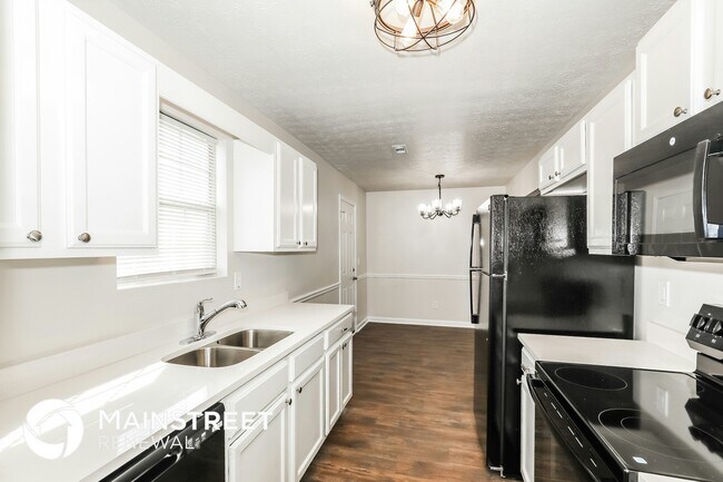 Foto del edificio - 9430 Sleepy Hollow Ln