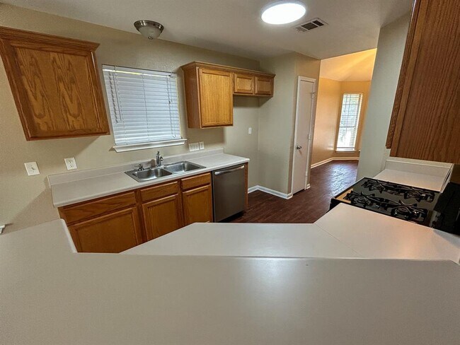 Foto del edificio - 305 N Heatherwilde Blvd