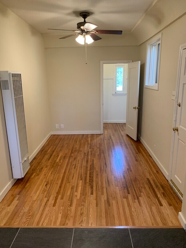 LIVING ROOM WITH REFINISHED FLOORS - 3844 Arlington Ave