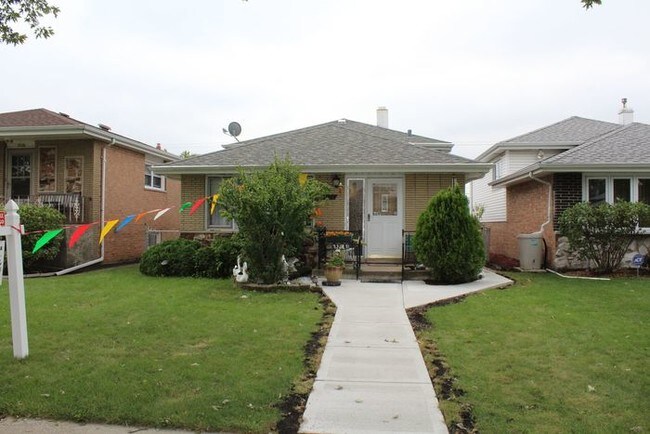 Building Photo - 7524 S Lorel Ave