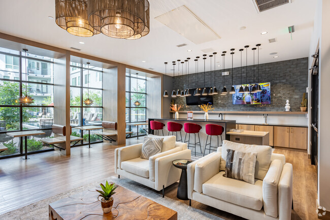 Clubroom with Shuffleboard - Traverse Apartments