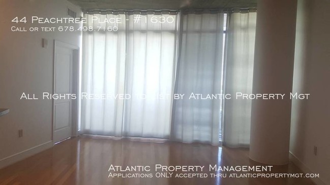 Building Photo - High rise condo Plaza Midtown