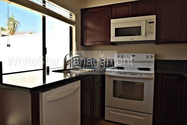 Building Photo - 48864 Desert Flower Dr