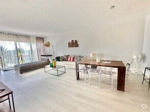 Building Photo - 10275 Collins Ave