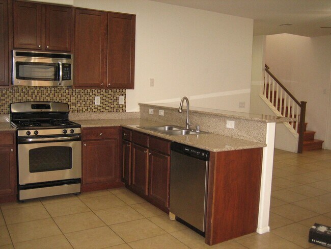 Building Photo - TWO STORY HOME, 3 BEDROOMS, 2.5 BATHS, 2 C...