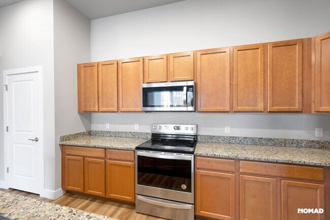 Foto del edificio - Charming 2BR-2BA Condo in Aurora Town Center