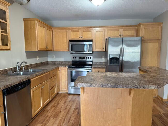 Building Photo - Spacious 3BR / 3BA Townhome with 2-Car Garage – Available Mid-March!