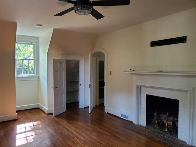 M. Bedroom w/ fireplace - 415 10th St NW