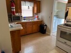 Laundry is off of kitchen - 25 Plunkett St