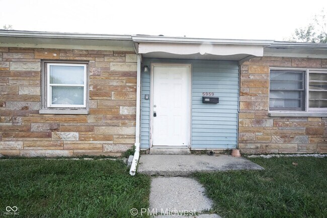 Foto del edificio - 5959 E 24th St