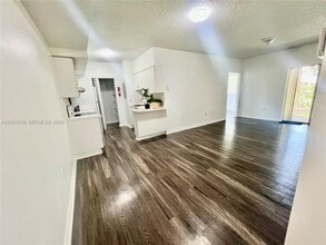 Building Photo - 3211 Sabal Palm Manor