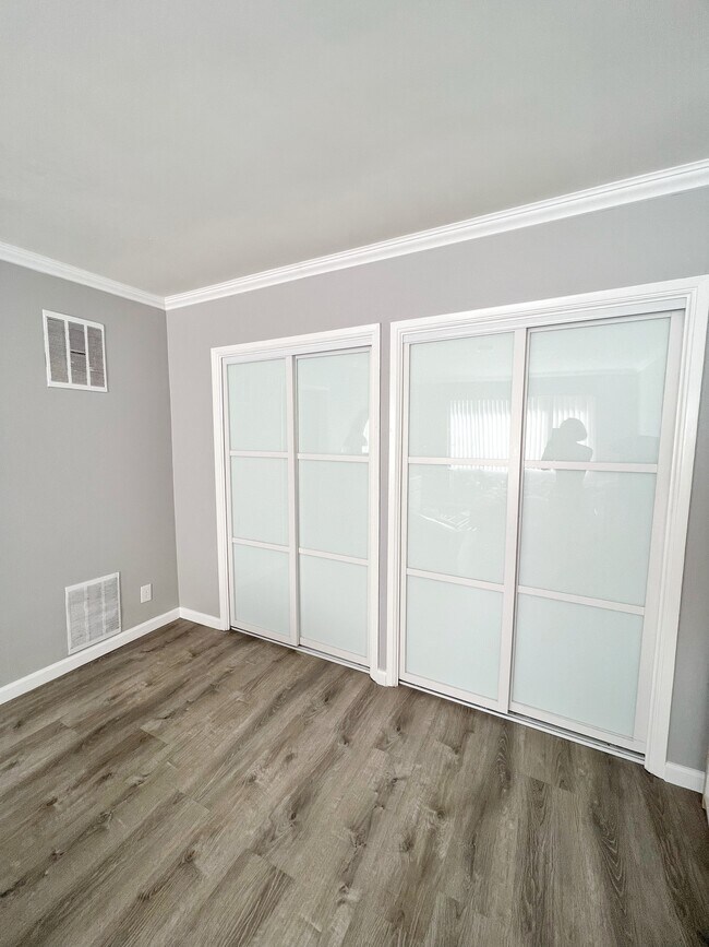 Big closet with sliding glass doors - 701 S Hobart Blvd