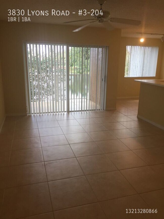 Building Photo - 1/1 condo with Lake View in Riviera Palms