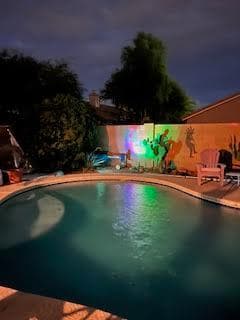 Pool at night - 7488 N Benet Dr