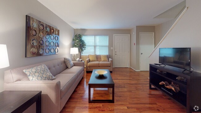Casa adosada de 2 habitaciones y 1 baño (821 pies cuadrados) - Sala de estar - Scott Gardens Apartments