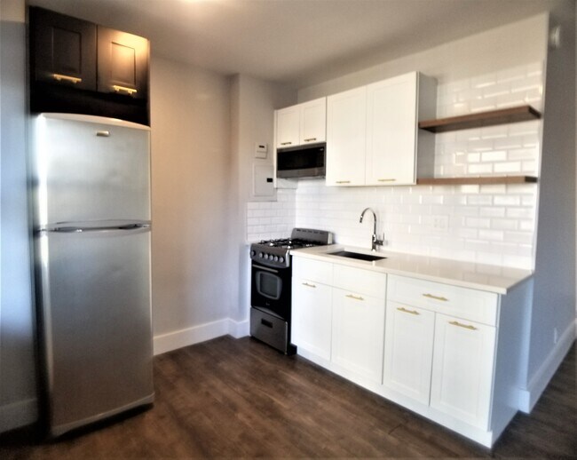 Building Photo - 1365 St Nicholas Ave