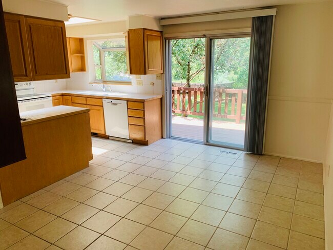Kitchen to deck - 12481 West 12th Place