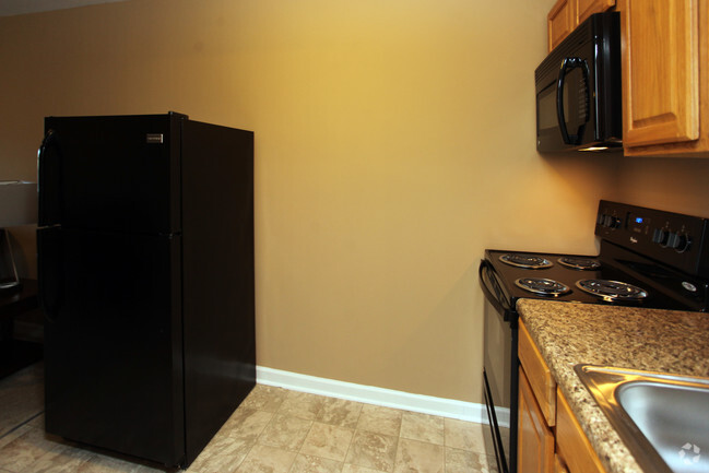 Small Studio Furnished Kitchen - Forest Ridge Apartments