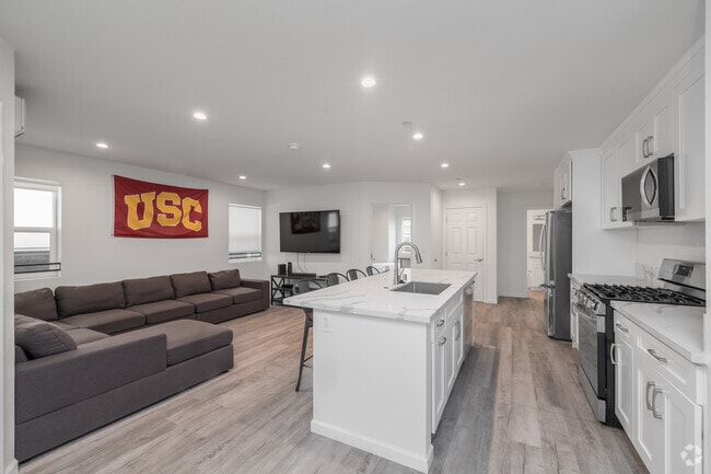 5BR, 3BA - 1,816SF - Living Room - The Hive On Ellendale USC Student Housing