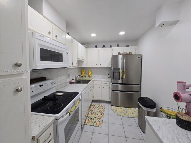 Building Photo - 6969 Collins Ave
