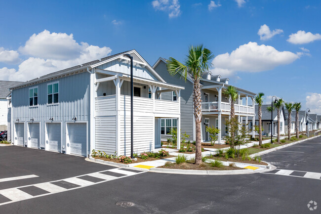 Sidewalk between buildings. - The Cottages at Myrtle Beach (new)