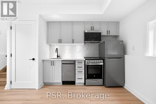 Photo du bâtiment - 218 Aileen Ave